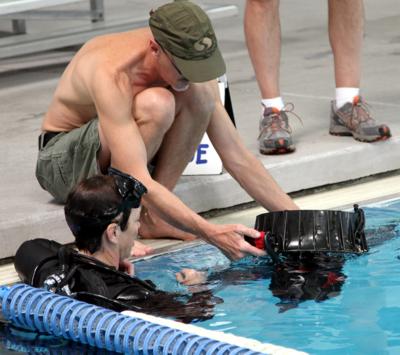 Trigger controls are explained for one of the test divers.